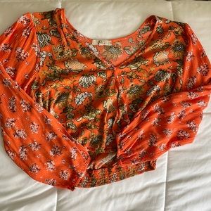 Long sleeve orange shirt never worn.